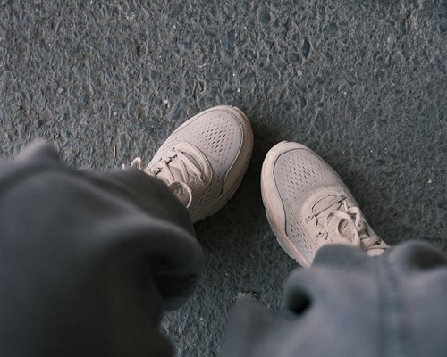 Comfortable walking shoes on a quiet residential street